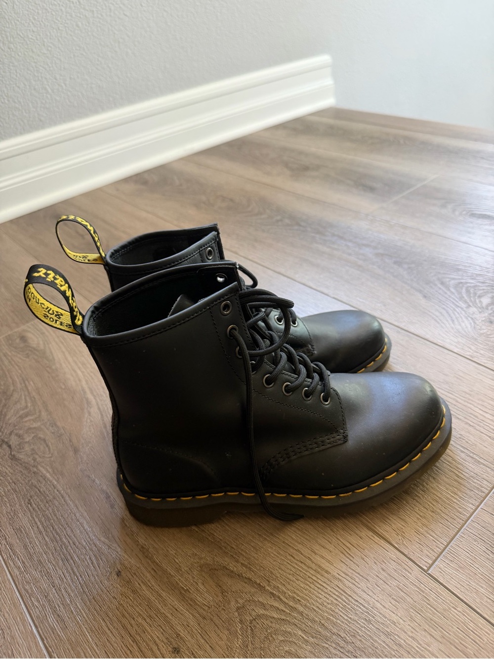 Dr. Martens Black Leather 8-Eye Lace-Up Boots with Yellow Stitching